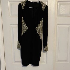 Chic Black Dress with Gold Lace Accents
